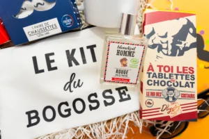 Cadeau homme inoubliable avec une eau de parfum rouge, une tablette chocolat noir avec message "à toi les tablettes de chocolat "